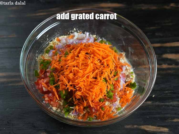 Step 11 – Add &frac14; cup&nbsp;<a href="https://www.tarladalal.com/glossary-grated-carrot-816i">grated carrot</a>.