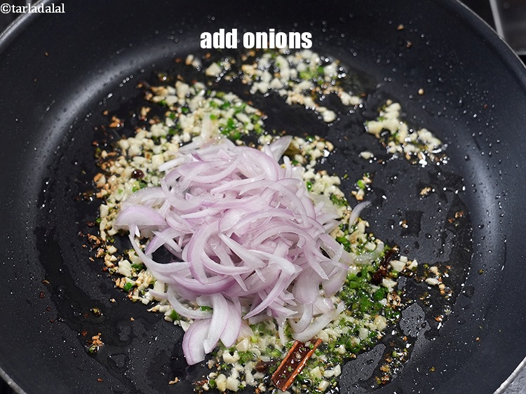 Step 15 – Add 1 cup <a href="https://www.tarladalal.com/glossary-sliced-onions-745i">sliced onions</a>.