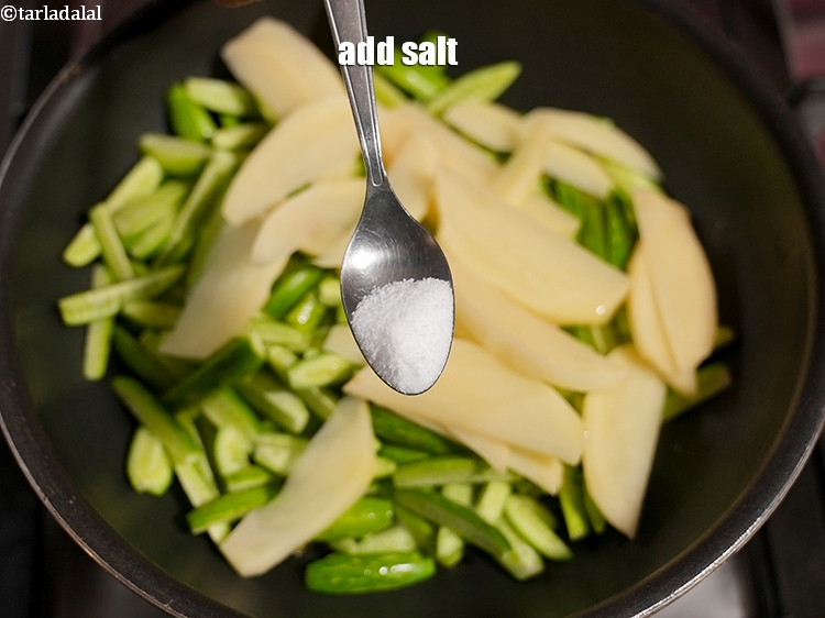 Step 11 – Add <a href="https://www.tarladalal.com/glossary-salt-namak-table-salt-418i">salt</a>&nbsp;to taste.