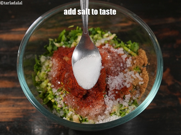 Step 12 – Add <a href="https://www.tarladalal.com/glossary-salt-namak-table-salt-418i">salt</a>&nbsp;to taste to&nbsp;<strong>undhiyu masala | Gujarati oondhiya masala | coconut coriander masala |</strong>
