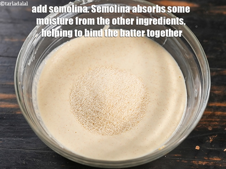 Step 12 – Add 4 tbsp <a href="https://www.tarladalal.com/glossary-semolina-sooji-rava-rawa-603i">semolina (rava / sooji)</a>. Semolina absorbs some moisture from the other …