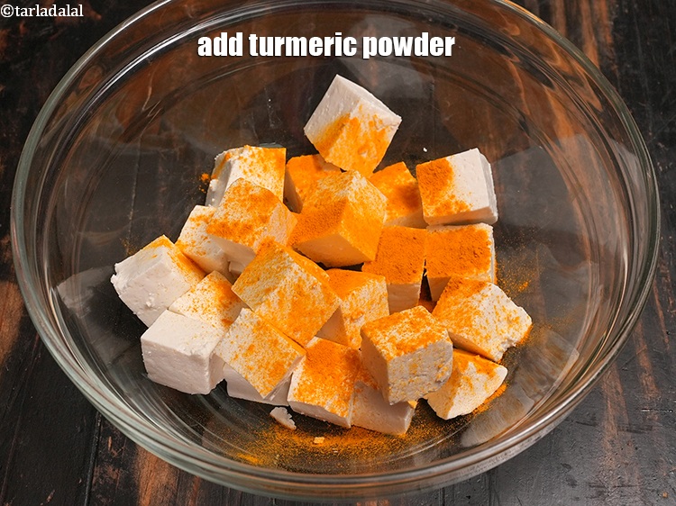 Step 11 – Add a pinch of <a href="https://www.tarladalal.com/glossary-turmeric-powder-haldi-645i">turmeric powder (haldi)</a>.