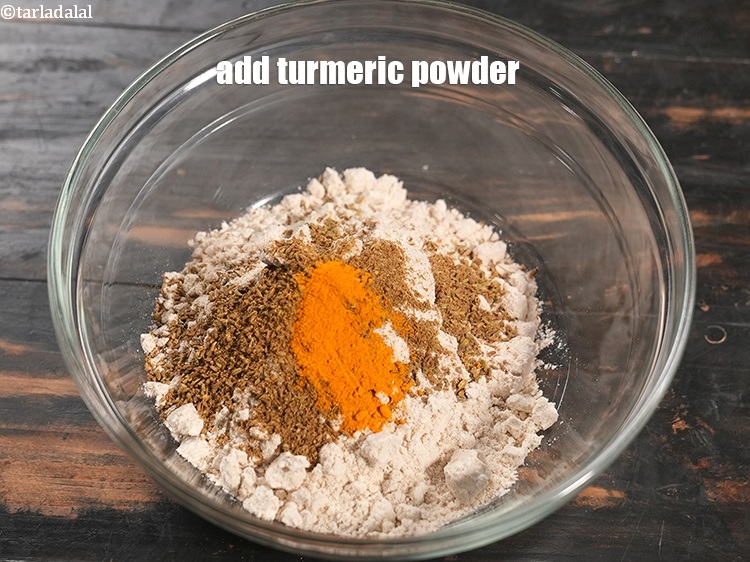 Step 11 – Add &frac14; tsp <a href="https://www.tarladalal.com/glossary-turmeric-powder-haldi-645i">turmeric powder (haldi)</a>.&nbsp;