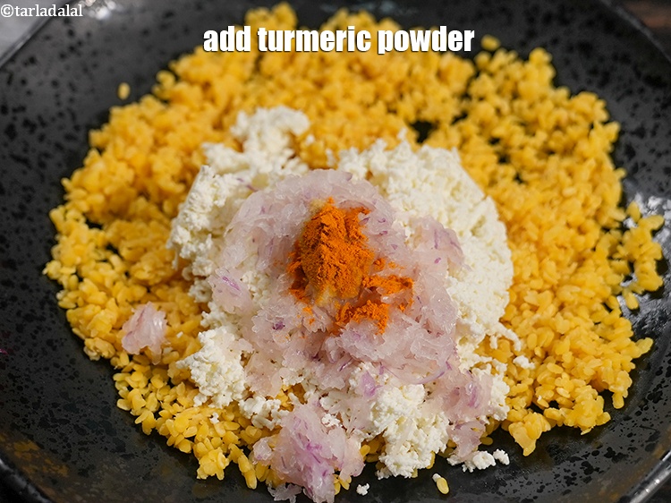 Step 12 – Add &frac14; tsp <a href="https://www.tarladalal.com/glossary-turmeric-powder-haldi-645i">turmeric powder (haldi)</a>.