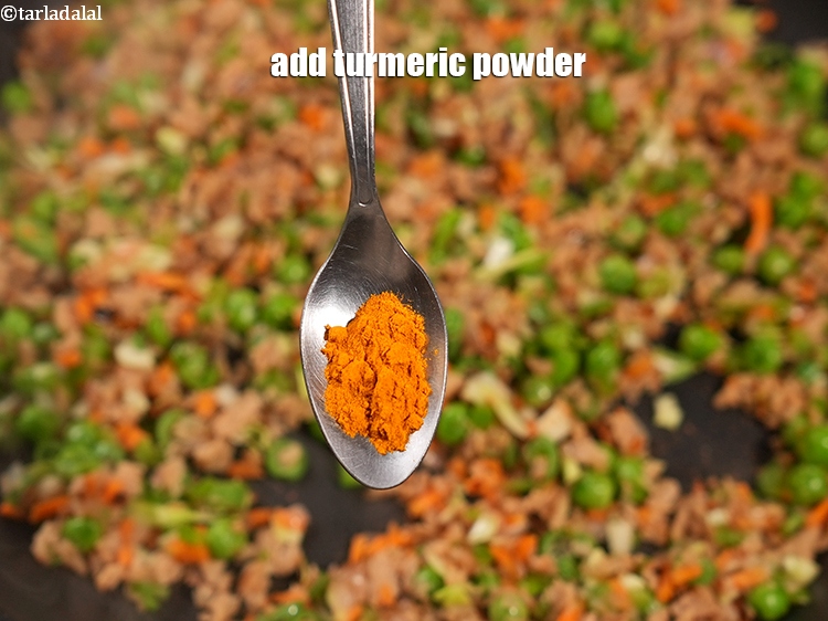 Step 11 – Add &frac14; tsp <a href="https://www.tarladalal.com/glossary-turmeric-powder-haldi-645i">turmeric powder (haldi)</a>.