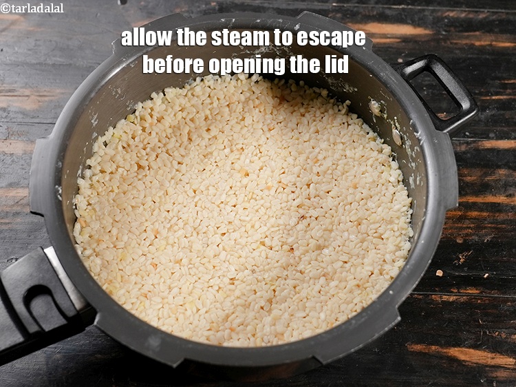 Step 11 – Allow the steam to escape before opening the lid.