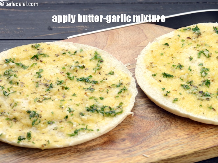 Step 11 – Apply little of the butter-garlic mixture on both sides.&nbsp;