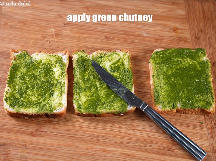 Step 11 – Apply 1 tsp <a href="https://www.tarladalal.com/green-chutney-22266r">green chutney</a>&nbsp;over it.