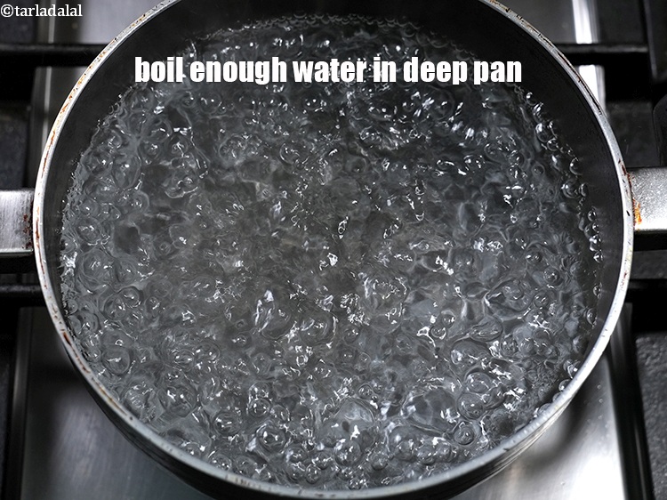 Step 11 – To make<strong> green masala karela</strong>, boil enough water in deep pan.