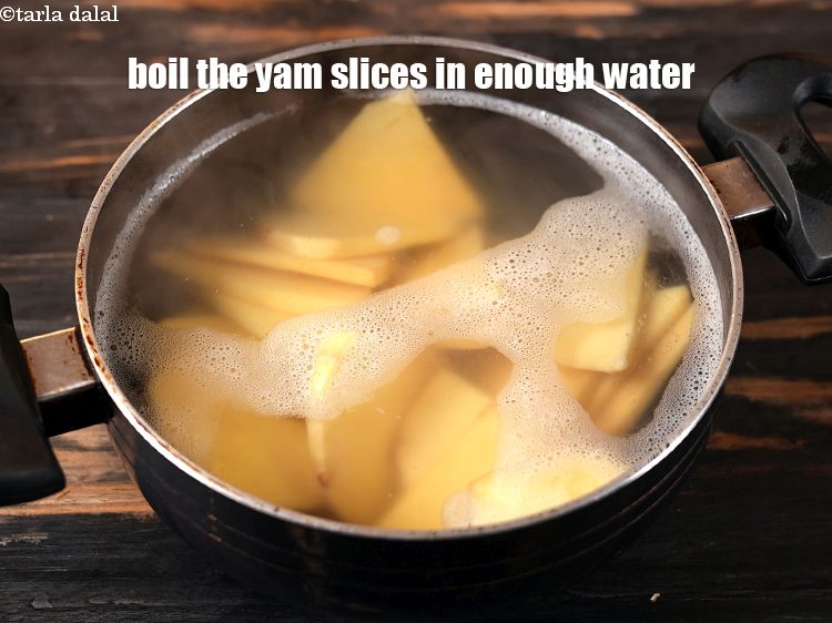Step 11 – To make suran fry, boil the <a href="https://www.tarladalal.com/glossary-yam-slices-2434i">yam (suran) slices</a> in a deep non-stick pan …