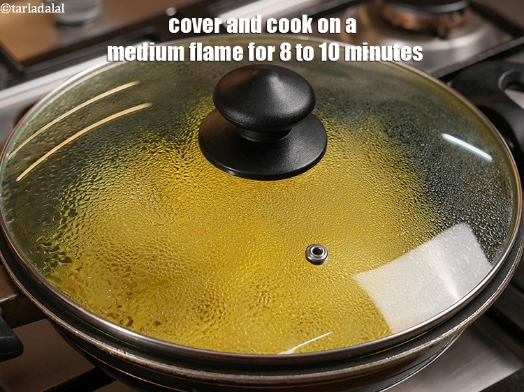Step 11 – Cover and cook on a medium flame for 8 to 10 minutes.