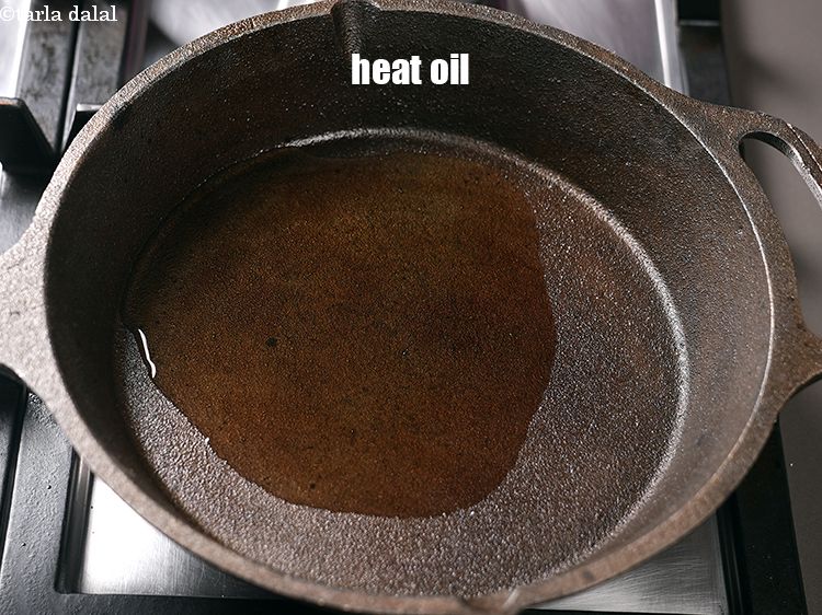 Step 18 – In a broad pan, heat 3 tbsp oil.