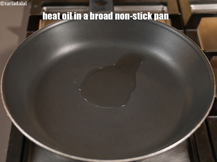 Step 12 – Heat 1 tbsp oil in a broad non-stick pan.