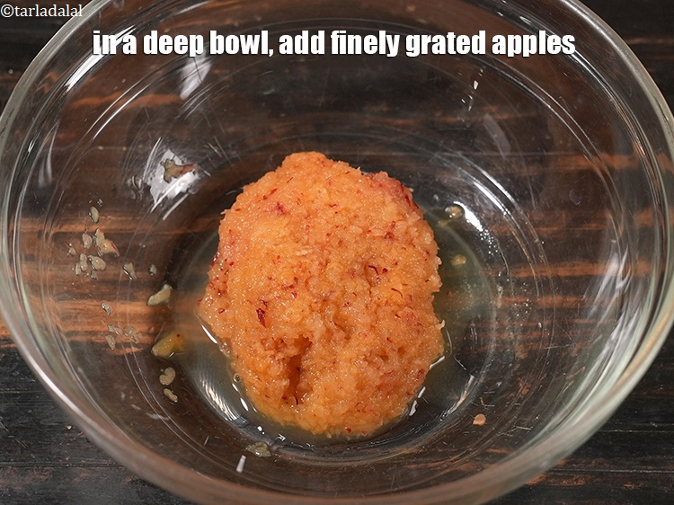 Step 11 – In a deep bowl, add &frac12; cup finely <a href="https://www.tarladalal.com/glossary-grated-apples-60i">grated apples</a>.