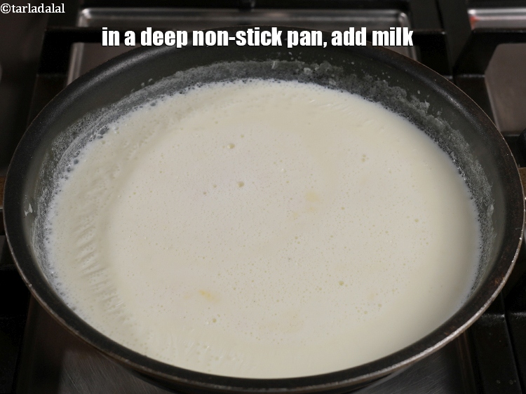 Step 11 – In a deep non-stick pan, add 4&frac12; cups of milk.