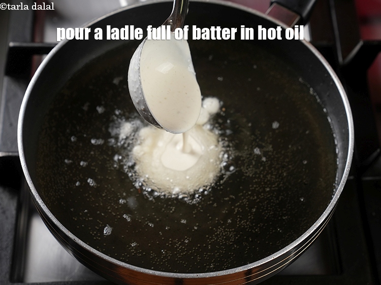 Step 23 – Heat oil in a pan and pour a ladle full of batter in hot oil …