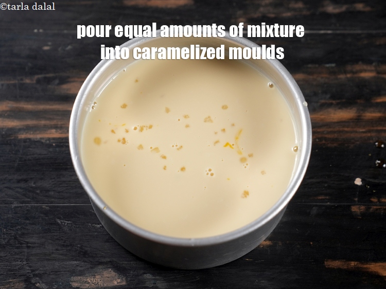 Step 11 – Pour equal amounts of mixture into each of the caramelized aluminium moulds and keep aside.