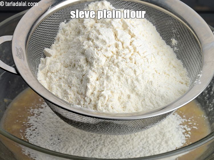 Step 11 – Sieve 1&frac12; cups <a href="https://www.tarladalal.com/glossary-plain-flour-maida-188i">plain flour (maida)</a>.