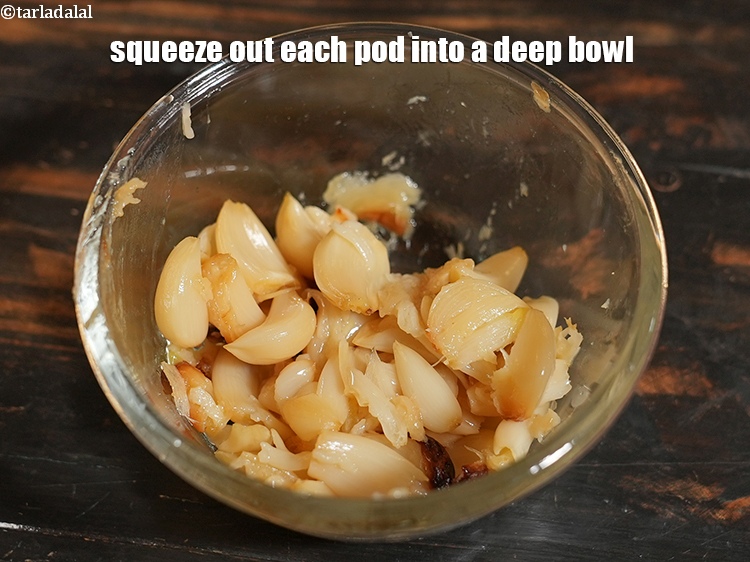 Step 11 – Squeeze out each pod into a deep bowl.