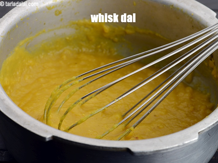 Step 11 – Remove, whisk the dal well and keep aside.