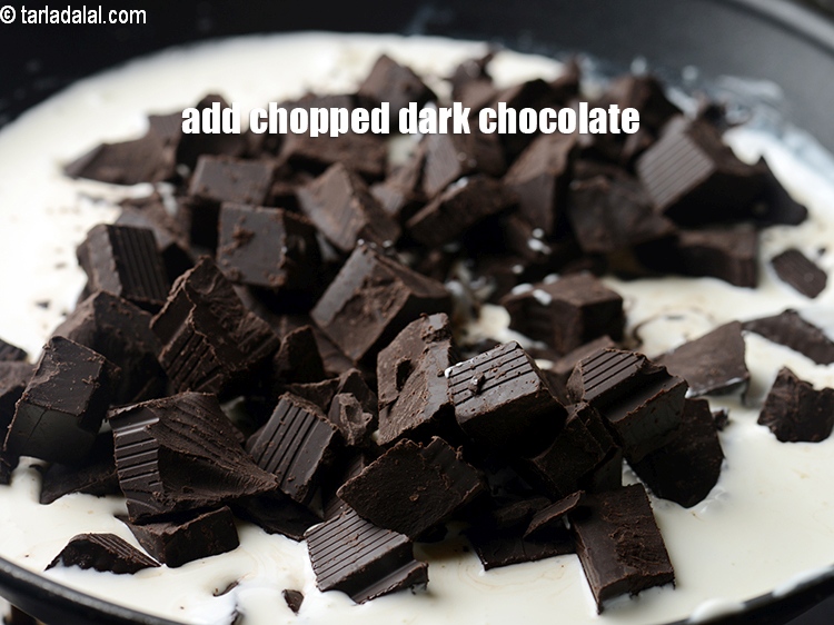 Step 11 – Switch off the flame, add 2 cup&nbsp;<a href="https://www.tarladalal.com/glossary-chopped-dark-chocolate-792i">chopped dark chocolate</a>.