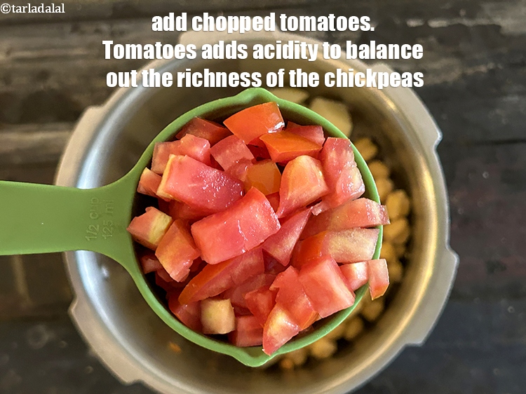 Step 14 – Add&nbsp;<meta charset="UTF-8" />1/2 cup&nbsp;finely&nbsp;<a href="glossary-chopped-tomatoes-779i">chopped tomatoes</a>.&nbsp;Tomatoes add acidity, sweetness, and umami to chickpea soup. The …