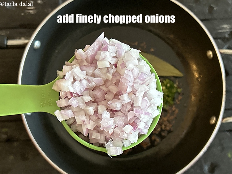 Step 18 – Add&nbsp;<meta charset="UTF-8" />1/2 cup&nbsp;finely&nbsp;<a href="glossary-chopped-onions-722i">chopped onions</a>.