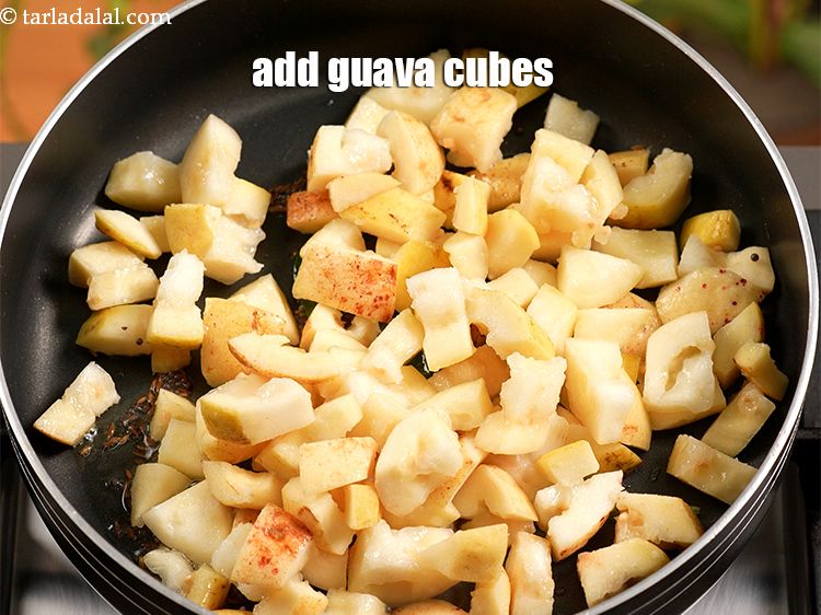 Step 11 – Add 2&nbsp;cups&nbsp;<a href="https://www.tarladalal.com/glossary-guava-cubes-2269i">guava cubes</a>&nbsp;(deseeded).