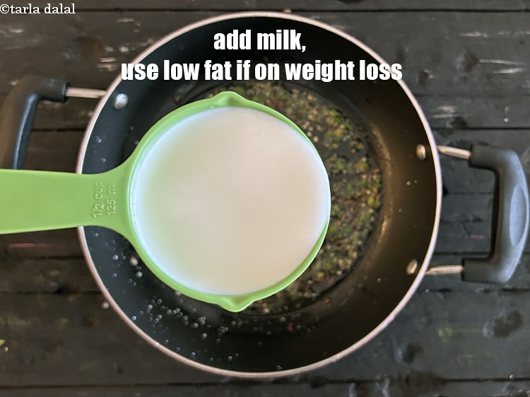 Step 16 – Add&nbsp;<meta charset="UTF-8" />1/2 cup&nbsp;<a href="glossary-milk-doodh-full-cream-milk-514i">milk</a>.