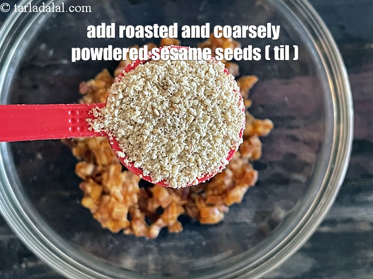 Step 18 – Add&nbsp;<meta charset="UTF-8" />2 tbsp&nbsp;<a href="glossary-roasted-and-powdered-sesame-seeds-2268i">roasted and coarsely powdered sesame seeds (til)</a>.