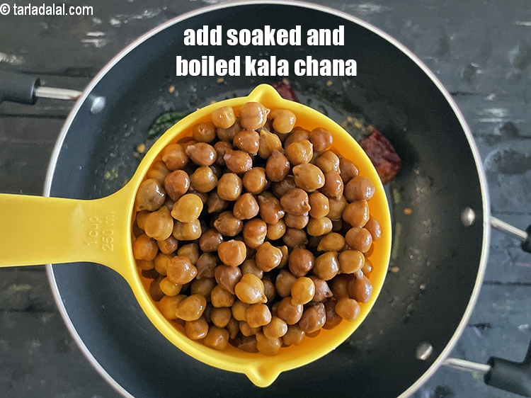 Step 23 – Add&nbsp;<meta charset="UTF-8" />2 cups&nbsp;soaked and&nbsp;<a href="glossary-boiled-kala-chana-1433i">boiled kala chana (brown chick peas)</a>.