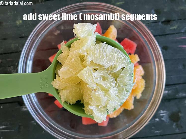 Step 12 – Add&nbsp;<!--%3Cmeta%20charset%3D%22UTF-8%22%20%2F%3E-->1/2 cup&nbsp;<a href="glossary-sweet-lime-segments-1057i">sweet lime (mosambi) segments</a>.