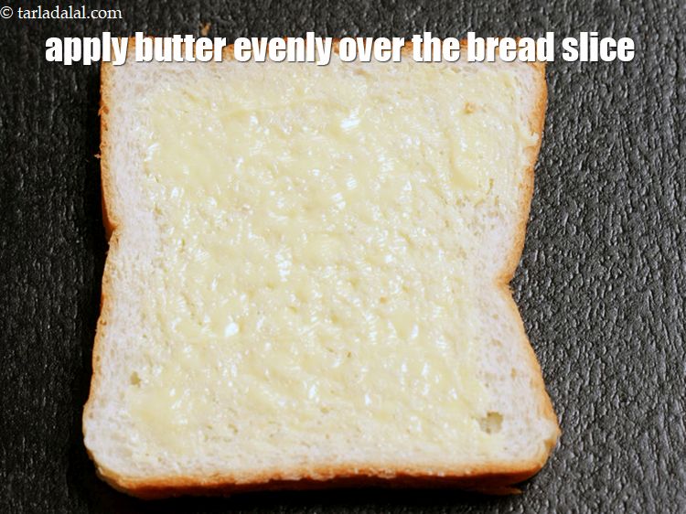 Step 11 – Apply 1/4&nbsp;tbsp butter evenly over the&nbsp;bread slice.
