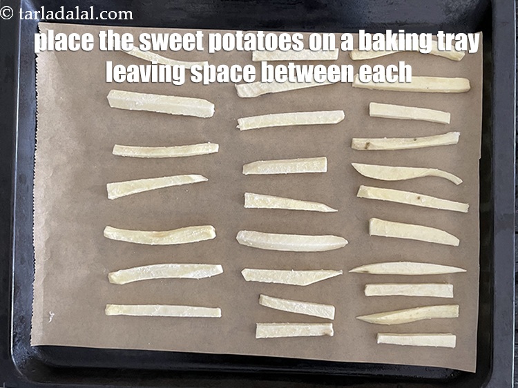 Step 30 – Place the cut sweet potatoes on a baking tray and ensure there is a gap …