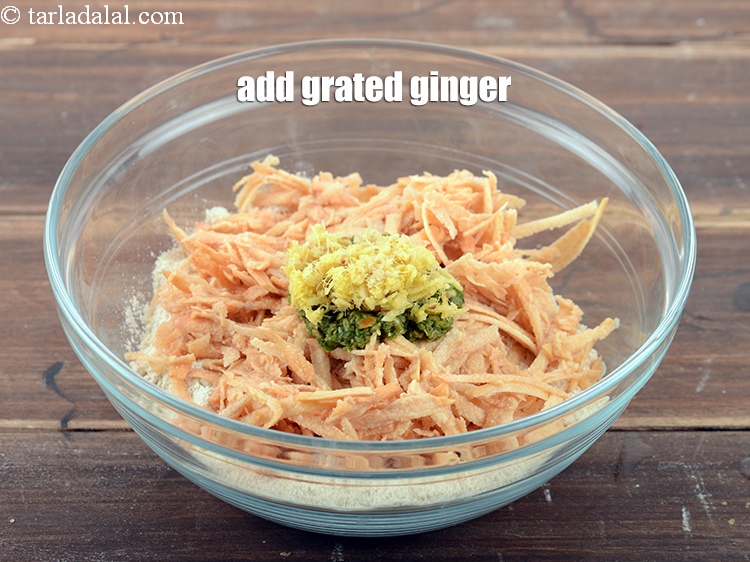 Step 11 – Add 2 tsp <a href="https://www.tarladalal.com/glossary-grated-ginger-943i">grated ginger (adrak)</a>.
