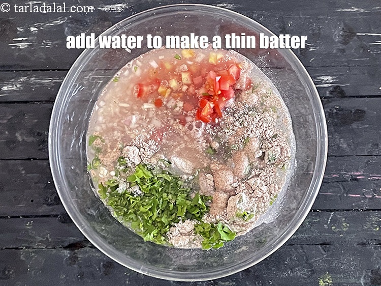 Step 11 – Add&nbsp;1 1/4th cup of water to make a thin batter.