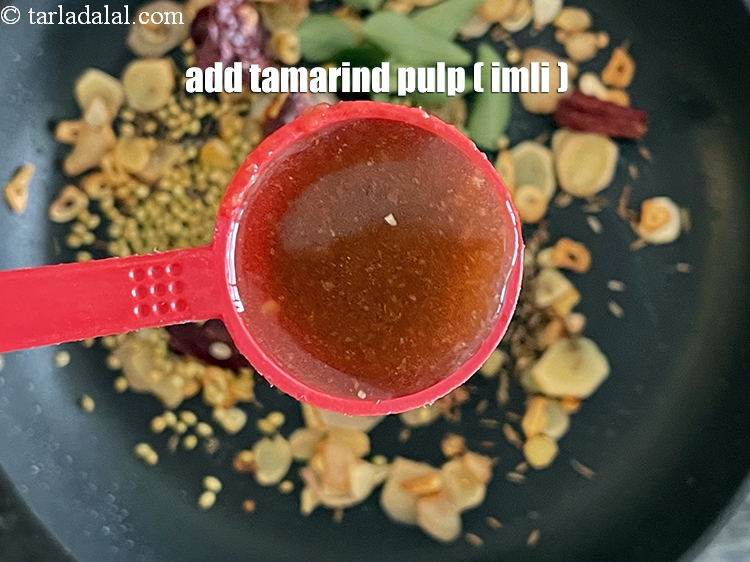 Step 11 – Add&nbsp;<meta charset="UTF-8" /><strong>2 tbsp&nbsp;tamarind pulp (imli).</strong>