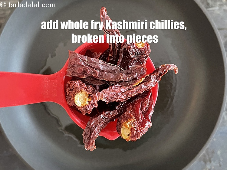Step 11 – Add&nbsp;<!--%3Cmeta%20charset%3D%22UTF-8%22%20%2F%3E-->7 to 8&nbsp;dry&nbsp;<a href="glossary-whole-dry-kashmiri-red-chillies-kashmiri-mirch-kashmiri-lal-mirch-332i">whole dry kashmiri red chillies</a>&nbsp;, broken into pieces.