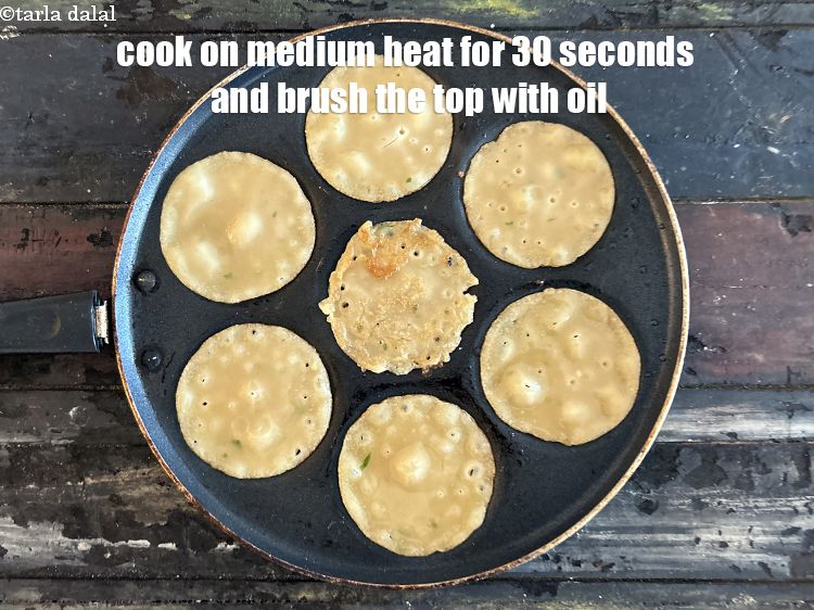 Step 11 – Cook on a medium flame on one side for 30 seconds and then brush the …