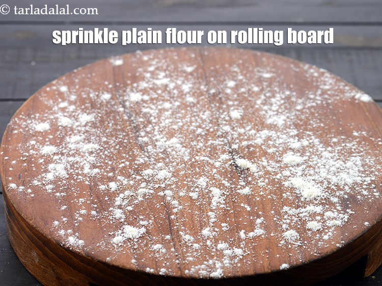 Step 11 – Sprinkle some plain flour on rolling board.