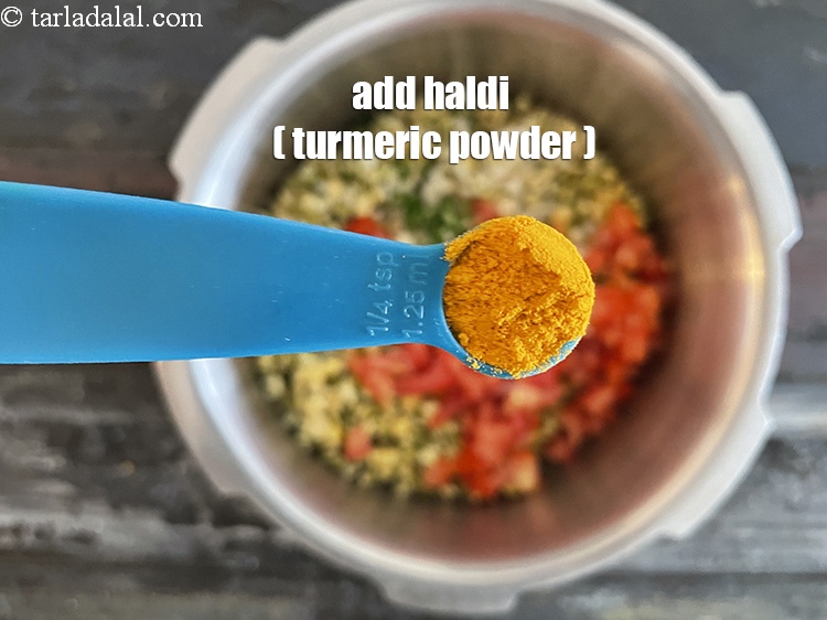 Step 11 – Add&nbsp;<meta charset="UTF-8" />1/4 tsp&nbsp;<a href="glossary-turmeric-powder-haldi-645i">turmeric powder (haldi)</a>.