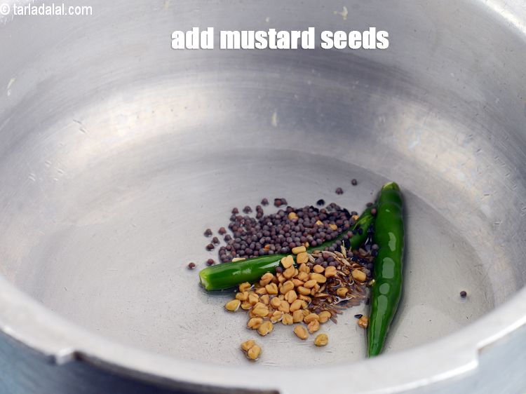 Step 11 – Add &frac14; tsp&nbsp;<a href="https://www.tarladalal.com/glossary-mustard-seeds-sarson-rai-sarson-ke-beej-525i">mustard seeds ( rai / sarson)</a>.