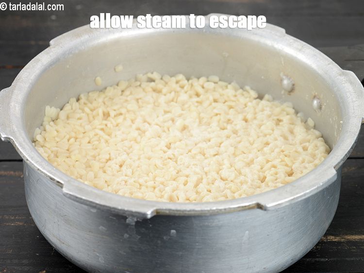 Step 11 – Allow the steam to escape before opening the lid. Keep aside.