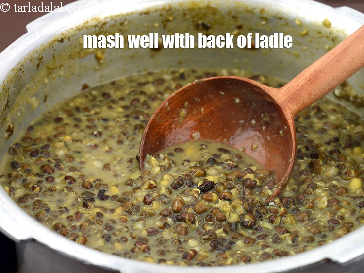 Step 11 – Allow the steam to escape before opening the lid. Mash well with the back of …