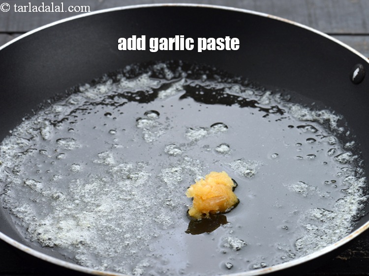 Step 11 – Add 1/2 tsp&nbsp;<a href="https://www.tarladalal.com/glossary-garlic-paste-lehsun-ki-paste-lahsun-ki-paste-350i">garlic (lehsun) paste</a>.