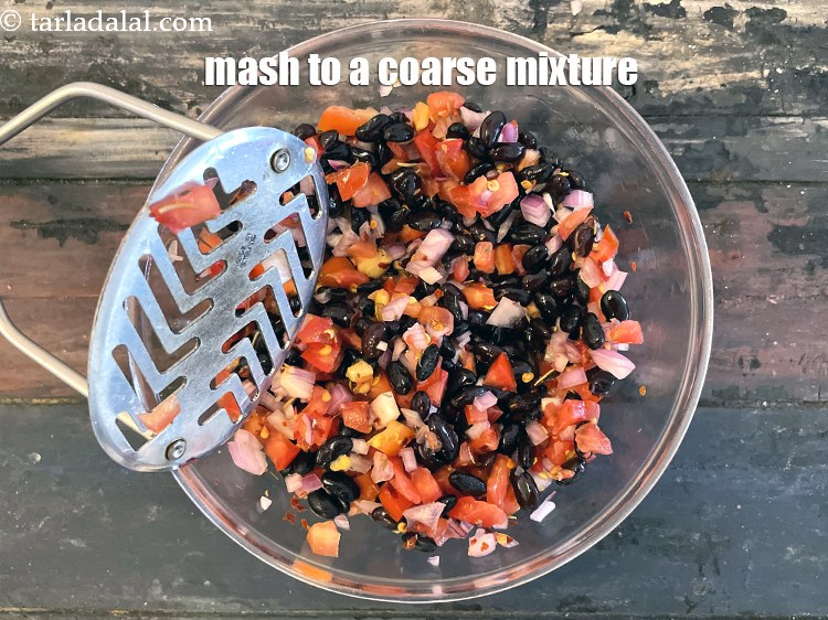 Step 25 – Mash to a coarse mixture using a potato masher.