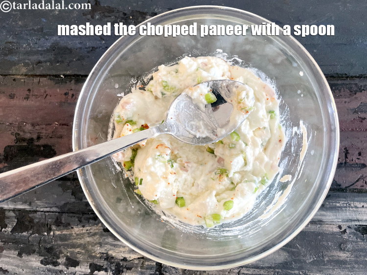 Step 21 – Mash the paneer with a spoon. This is important as we don't want some particles …