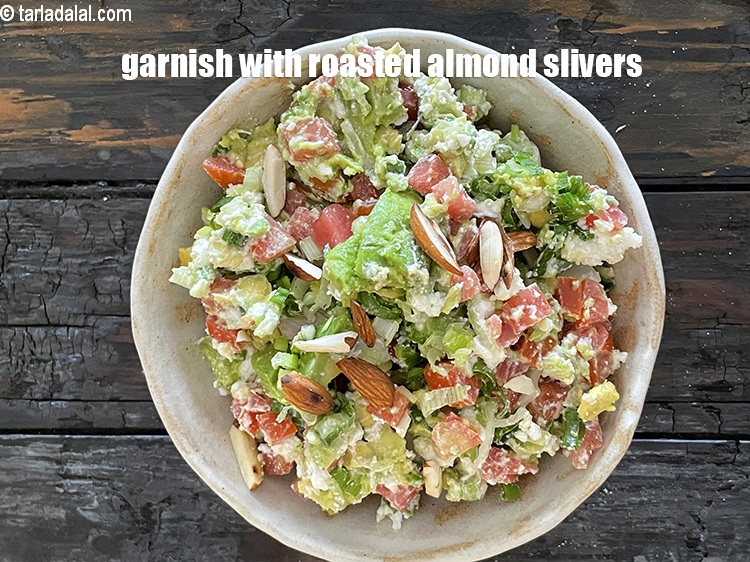 Step 11 – Garnish with roasted almond slivers. Roasting the almonds give a nice flavour to the salad.&nbsp;