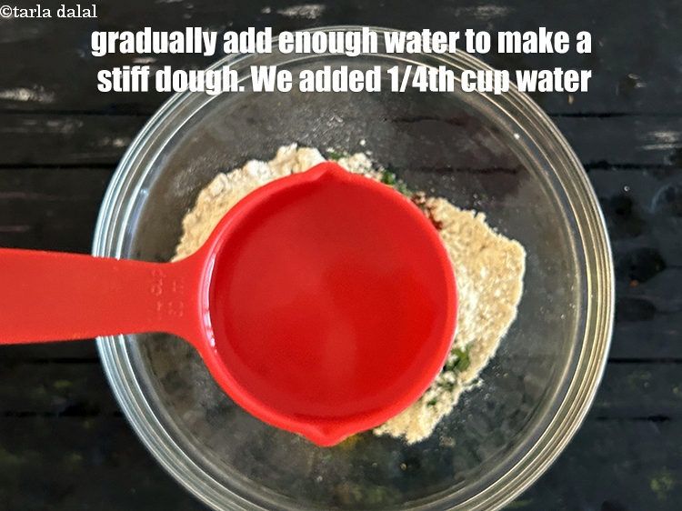 Step 24 – <meta charset="UTF-8" />Gradually add enough water to make a&nbsp;<strong>stiff dough</strong>. We added 1/4th cup water.&nbsp;