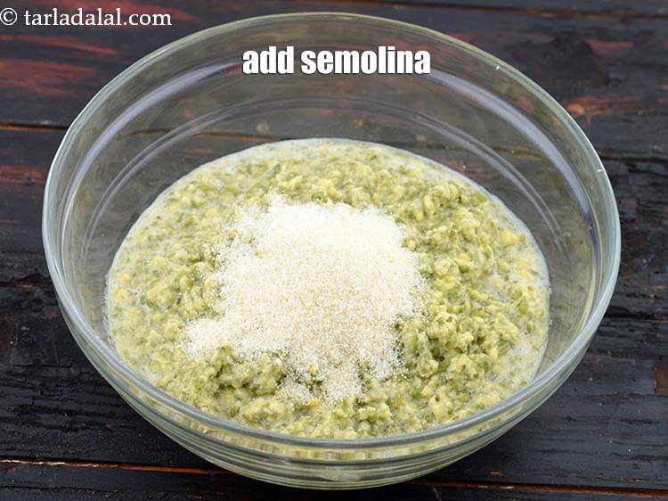 Step 11 – Add 2 tbsp&nbsp;<a href="https://www.tarladalal.com/glossary-semolina-sooji-rava-rawa-603i">semolina (rava/sooji)</a>.&nbsp;